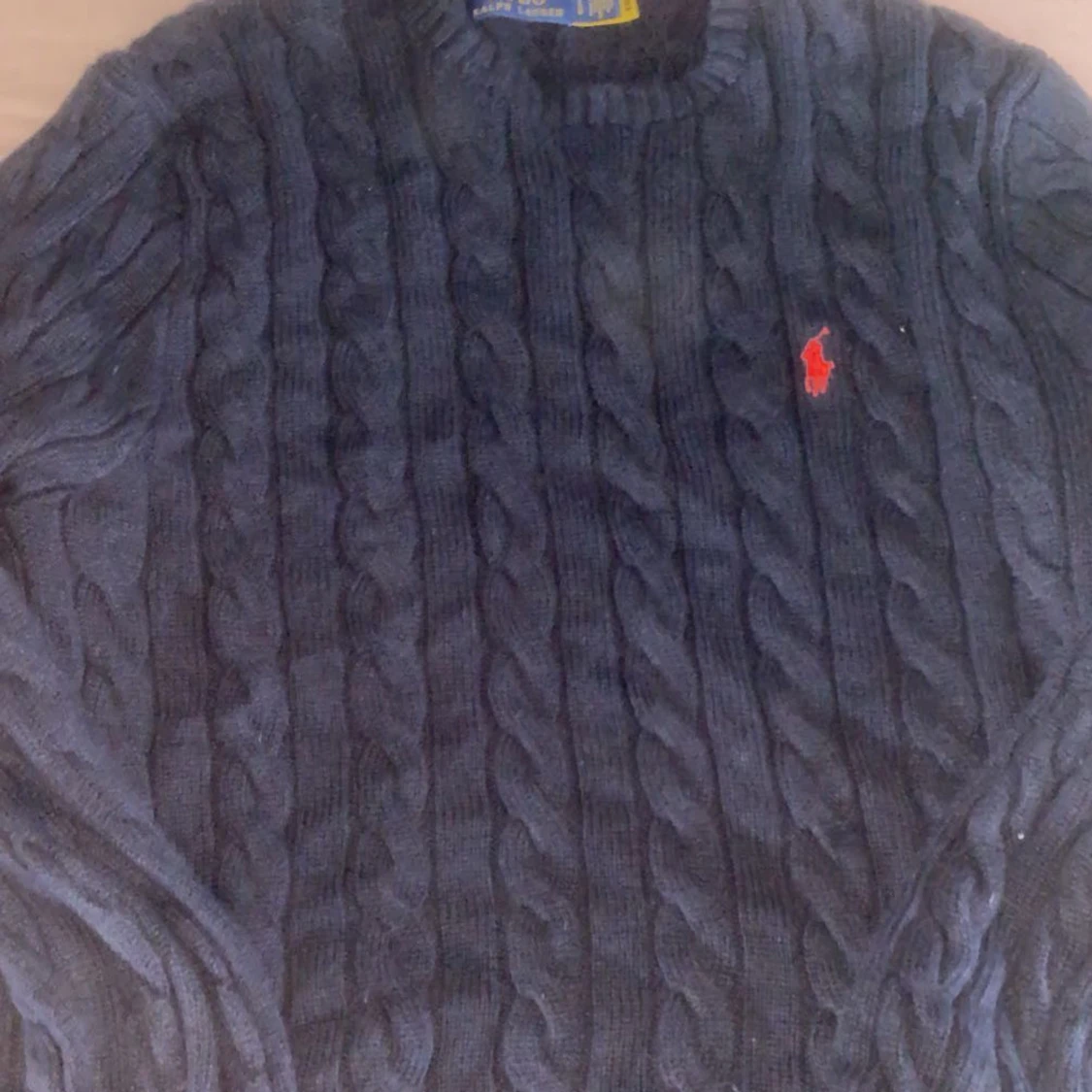 Mörkblå stickad tröja från Ralph Lauren