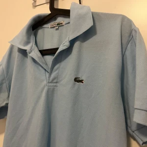 Lacoste pikétröja  - Helt ny 