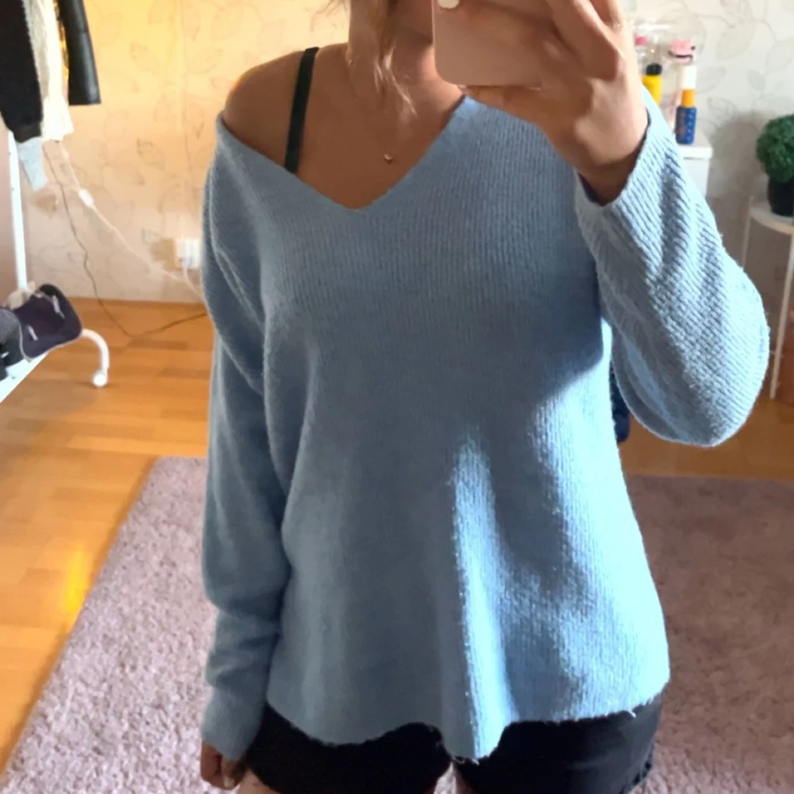 Ljusblå stickad tröja