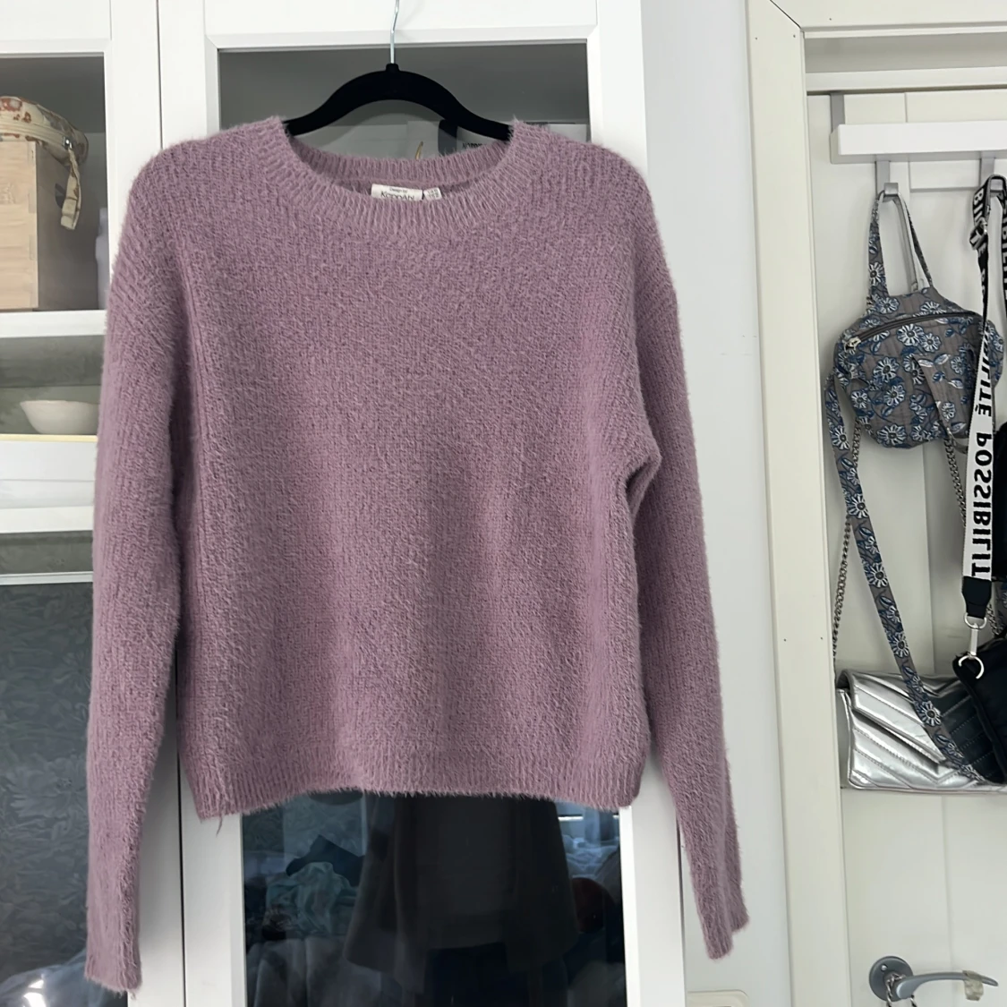 Lila stickad tröja