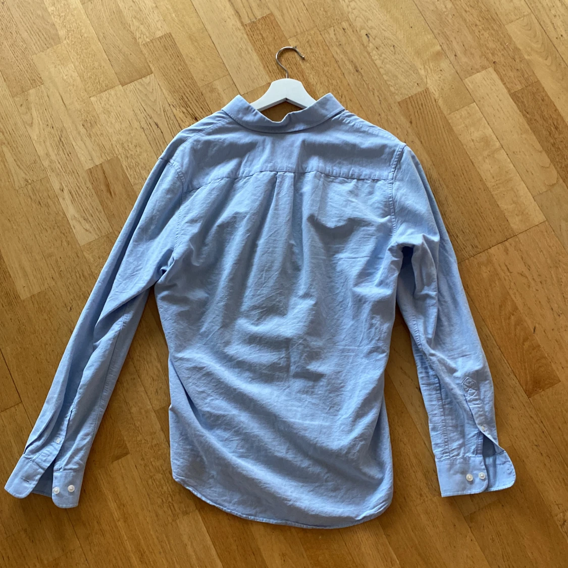 Ljusblå skjorta i oxfordtyg - 91