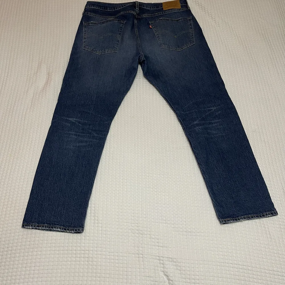 Väldigt fina Levis jeans  502 TAPER SQUEEZY JUNCTION Storlek: W36 L30. Jeans & Byxor.