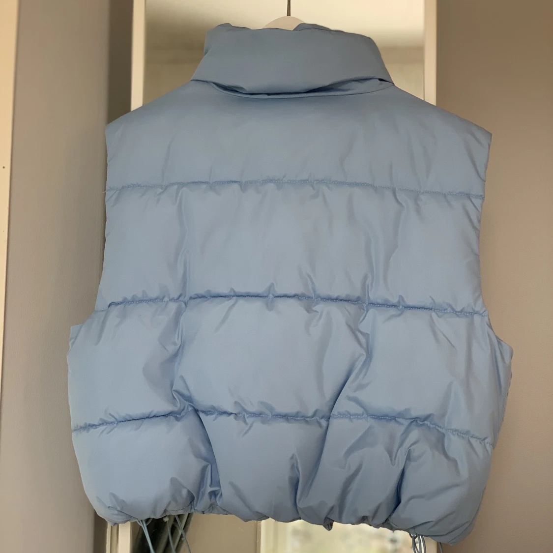 Ljusblå Väst  - 90