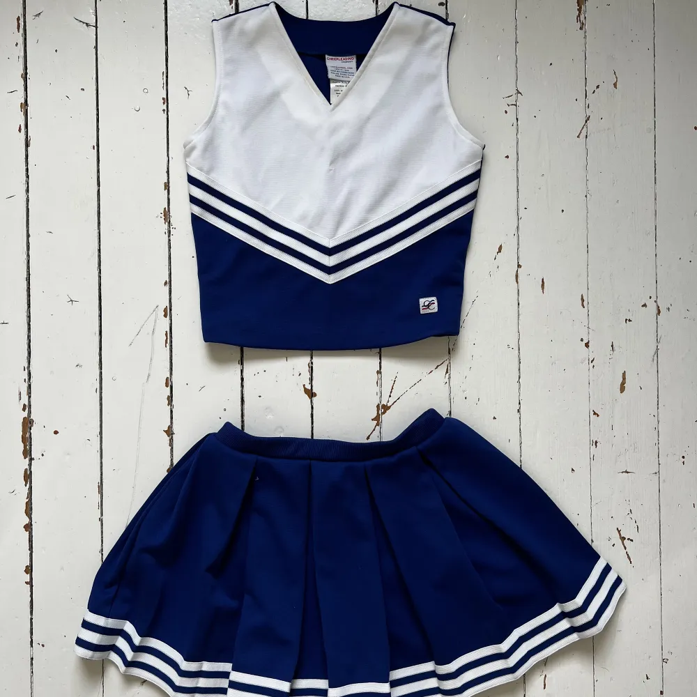 Fint vintage cheerleaderset i blått och vitt, strl XS.  . Kjolar.