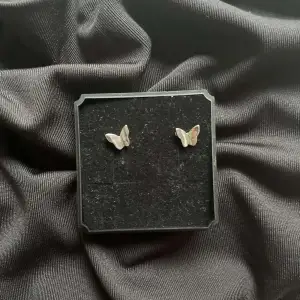 Fjäril öron hängen