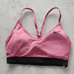 NIKE sports bra - NIKE sports bra, small defect on the black underhand - see photo