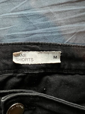 Jeans shorts  - Jeans shorts från H&M . Fint skick lite sliten i färgen storlek M 