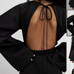 Klänning - Superfin svart satinklänning med öppen rygg från nakd💞Endast använd en gång så i nyskick! I storlek 34 men passar även 36💞