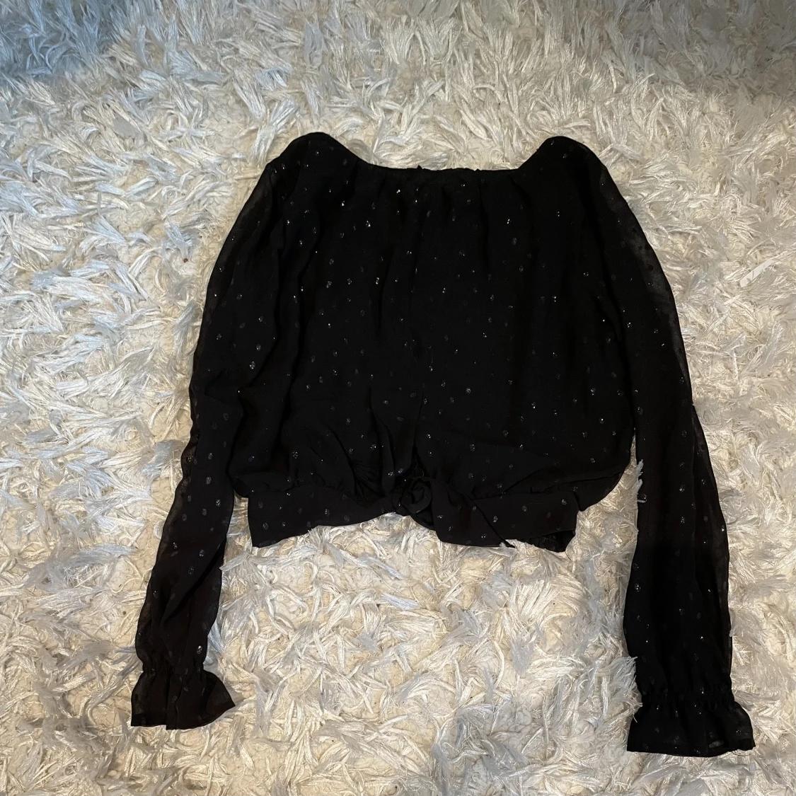 Glittrig tröja från H&M