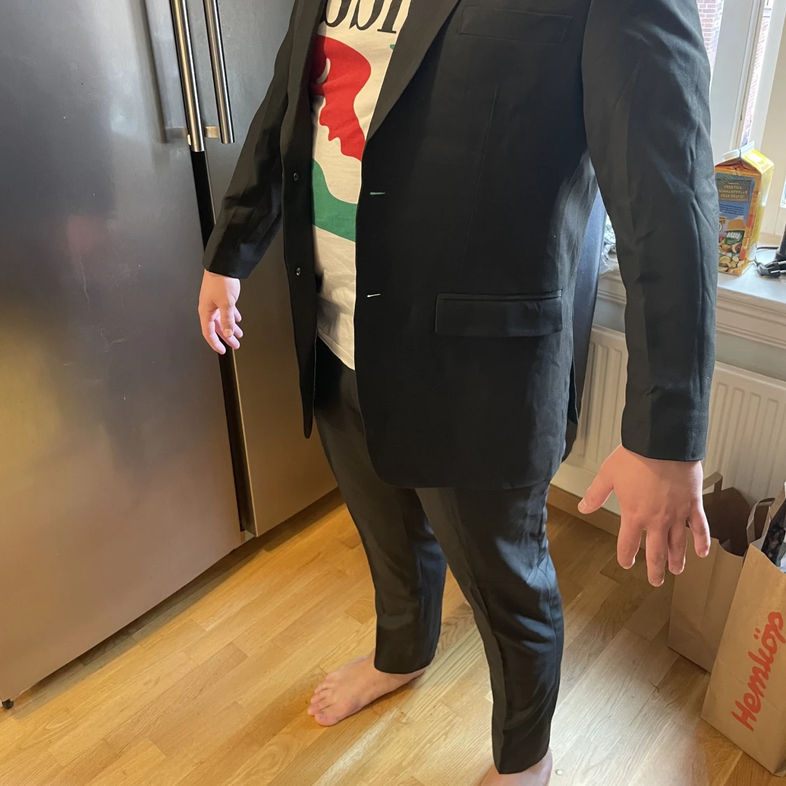 Svart kostymjacka och byxor - 91