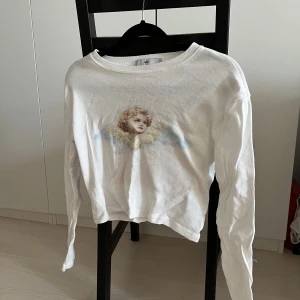 Tröja från Adika - Tröja från Adika med ängel som modell. Storlek S.