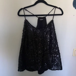 Glitter topp - Tecken på andhämtning men super fin storlek syns ej men sitter som en s.