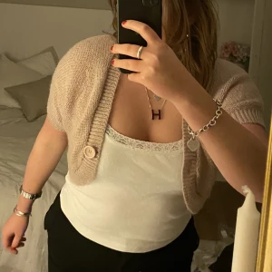 Glittrig kofta i mohair  - Kofta i mohair blandning från HM, glittrig beige 