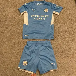 Fotbollskläder Manchester city,Tränings t-shirt och shorts