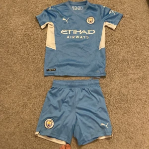 Manchester city outfit - Fotbollskläder Manchester city,Tränings t-shirt och shorts