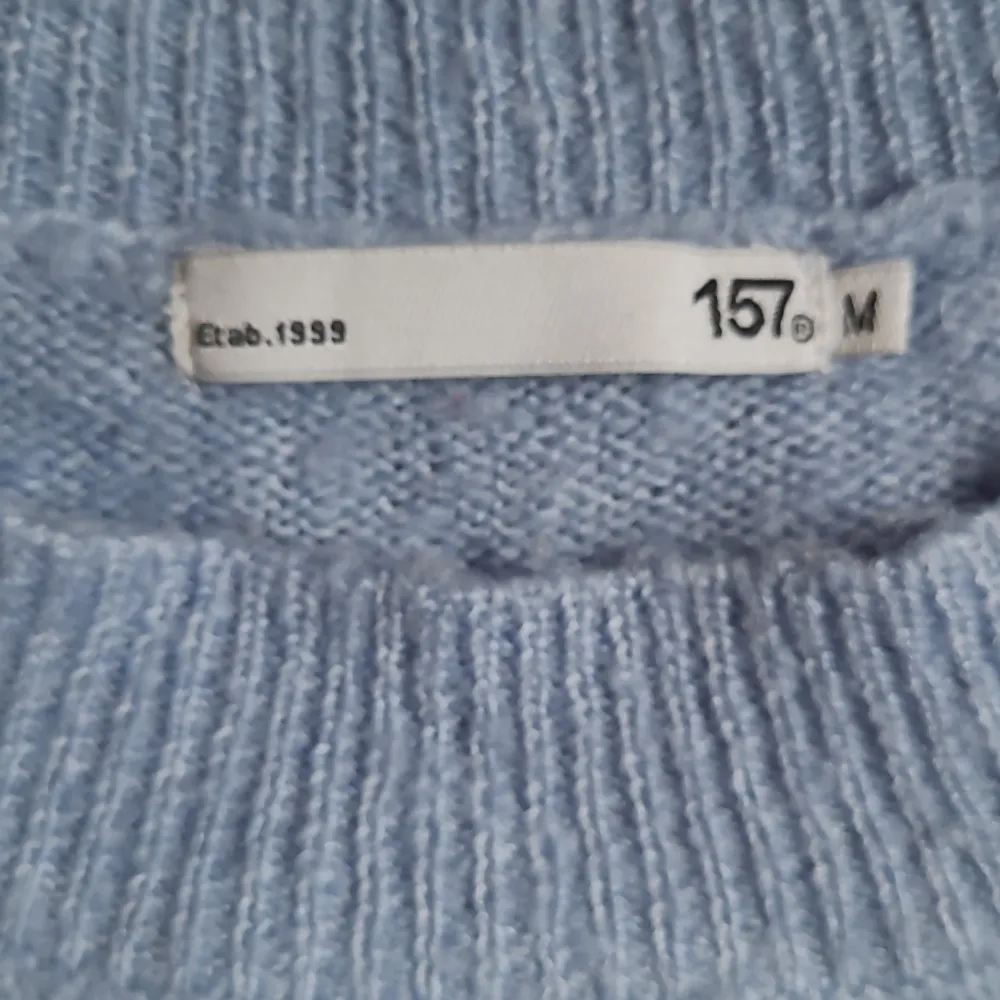 Blå stickad tröja från Lager 157 i stl M. Stickat.