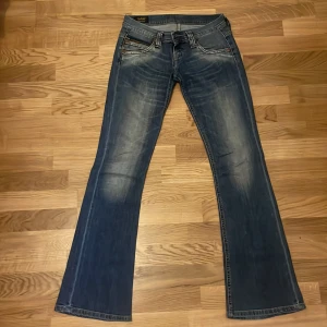 Lee Jeans - Lynn Dart, W26 L33, lågmidjade bootcut jeans 