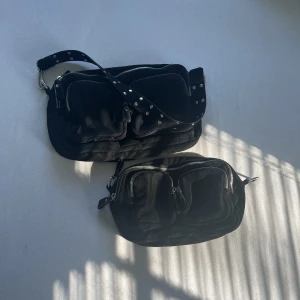 Handväska - 2 stycken handväskor, en liten och en lite större med ett band!