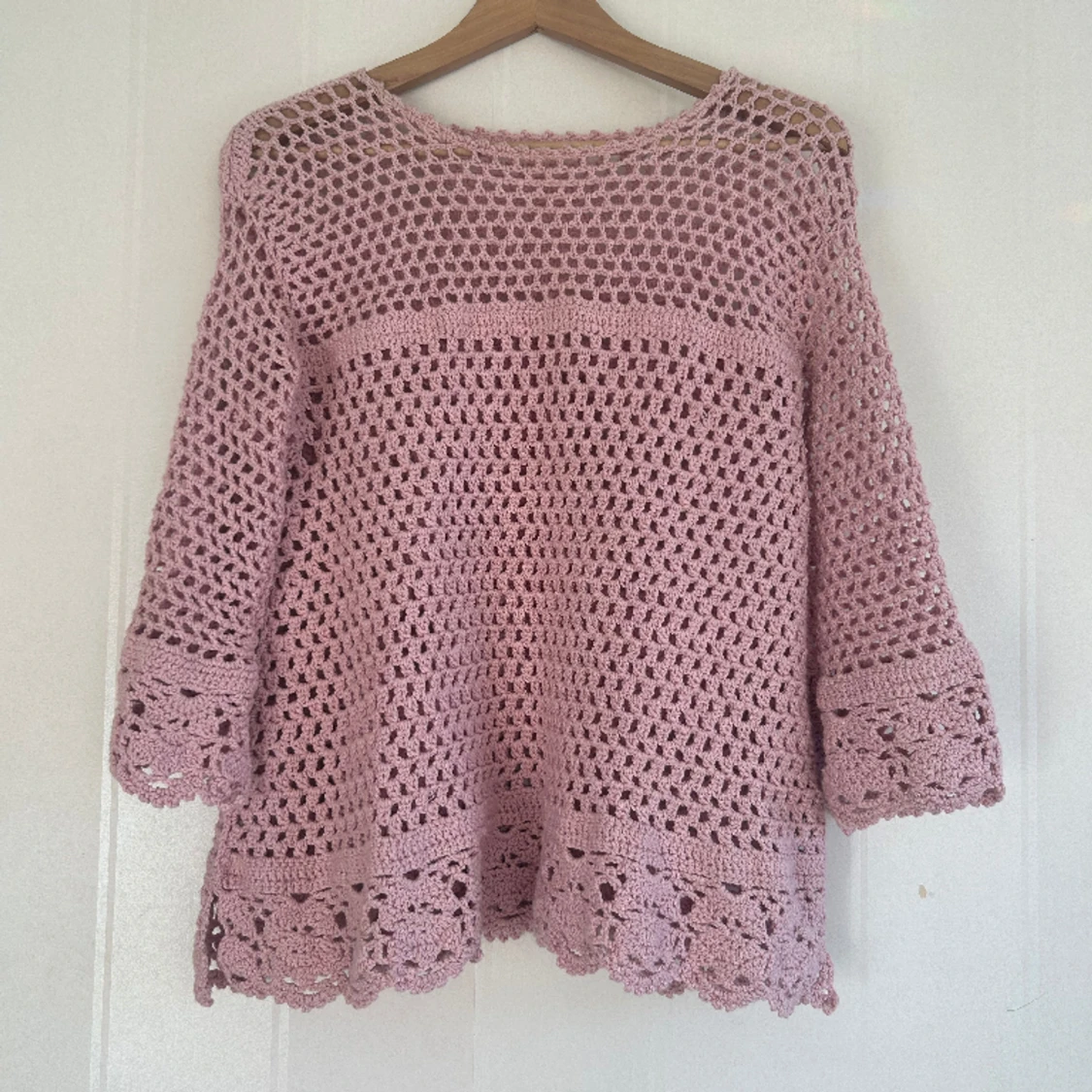 Rosa virkad tröja