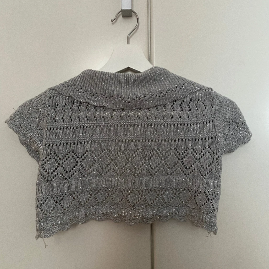 Silverglittrig bolero - 90