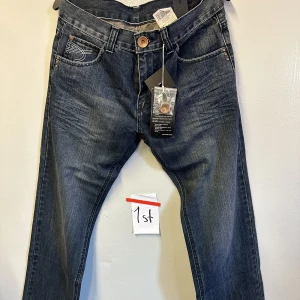 Outfitters nation jeans strl W31 L30  - Outfitters nation jeans strl W31 L30 - nya med lappar kvar