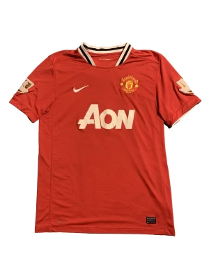 Manchester United 2011/2012   - Storlek Large  Skick 6/10 Namn på ryggen Rooney