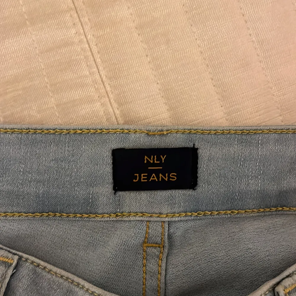 Ljusblå lågmidjade bootcut jeans från Nelly. Använda 1-2ggr. Storlek 36/S. Långa i benen. Jeans & Byxor.
