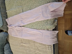 Slit jeans - One are rose, one are grey, size 34, one pair 150, two pairs 250