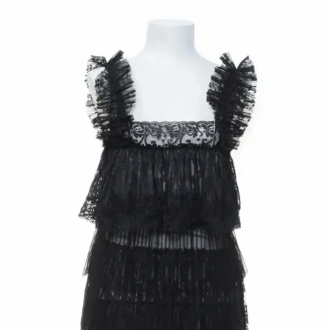 Svart spetsklänning