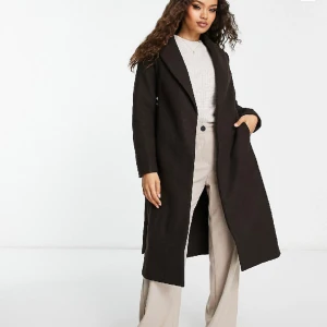 Brun kappa - Brun kappa storlek :34 