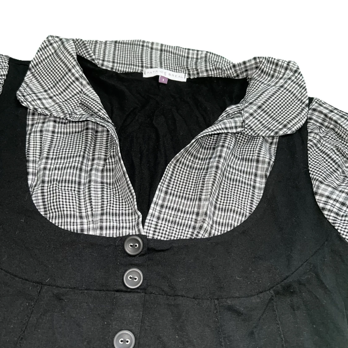 Rutig topp med svart västdetalj - 91