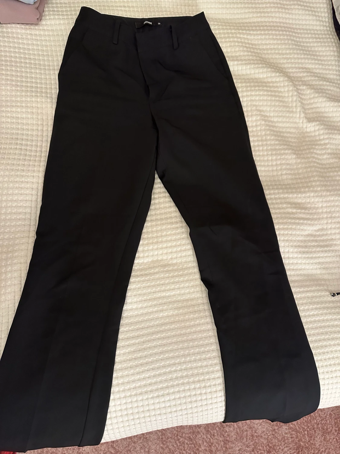 Högmidjade kostymbyxor