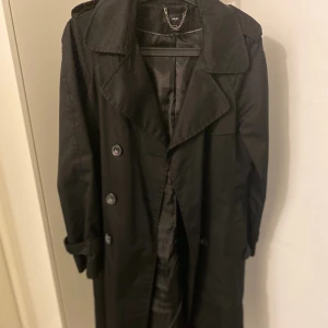 Trenchcoat  - Skicklig