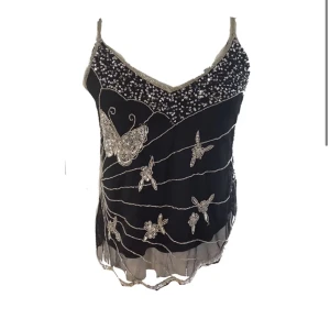 Glitter linne - Finns att köpa på jealoussecondhand.com