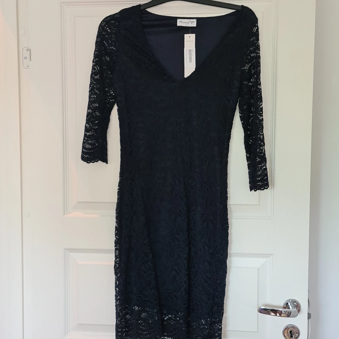 Helt ny spetsklänning