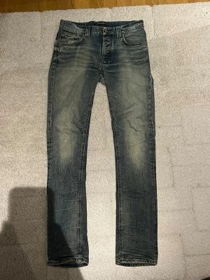 Nudie jeans  - Sälja dessa unika nudie jeans i modell Grim Tim. Storlek är W31 L34. Frågor så är det bara att ställa. 