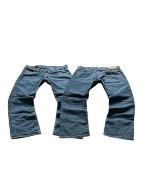 Blåa Rare  Levis 506 Bootcut / Regular Fit Jeans Storlek W34 L30 - Mycket fina Levis Jeans i blå färg. | Jeansen är i mycket bra skick och sparsamt använda. |  Äkta som allt annat jag säljer! ✅ |  Storlek: W34 L30 | Skick: Mycket Bra Skick | Färg: Blå | Märke: Levis | Modell: Jeans |   Hör gärna av dig vid frågor så svarar jag så fort jag kan! 😁 |  (SKU - 249)