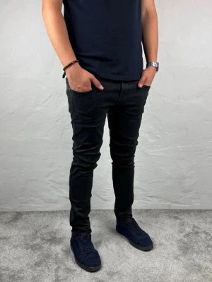 Replay jeans  - Ett par riktigt snygga jeans från Replay i storlek W32 L32 i modellen Anbbas Hyperflex 
