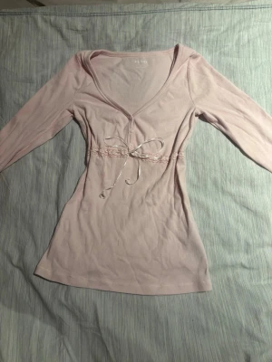 Hollister Babydoll topp - Säljer en jätte fin Hollister babydoll topp i fint skick.