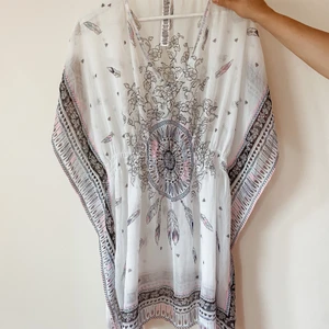 Strandklänning - Strandklänning - oanvänd. 