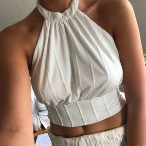 Vit halterneck - Sparsamt använd