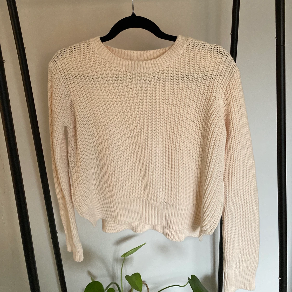 Stickad tröja med dragkedja