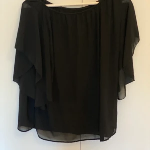 Blus  - Svart blus one size