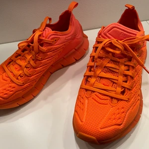 Reebok Orange Sneakers - Used only once! Really comfortable. Color bright orange 