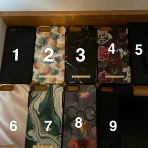 Mobilskal till iPhone  - 1. Holdit skal 70kr. 2 & 3 & 4 & 6 & 7 ideal of sweden 100kr. 5. Kuvert skal 150kr. 8.Harry Potter 30kr. 9.skal med kortfack 80kr och det tillkommer frakt 