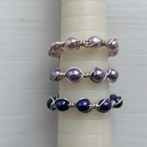Beeded rings, designed to relieve anxiety and stress. Three options- Blue, Pink and Purple.