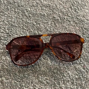 Solglasögon  - Aldrig använda 