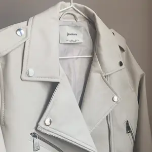 White faux leather jacket in off white, size L