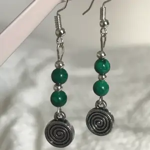 these green malachite earrings are a really cute and powerful accessory! malachite is a guardian stone; protecting you from negative energyand resisting temptations.