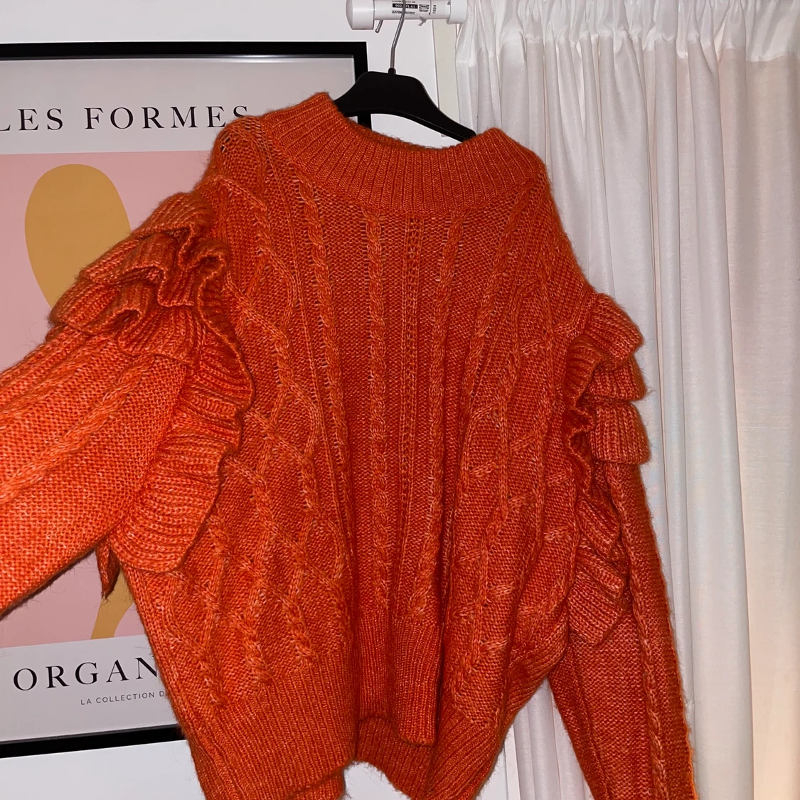 Orange stickad tröja
